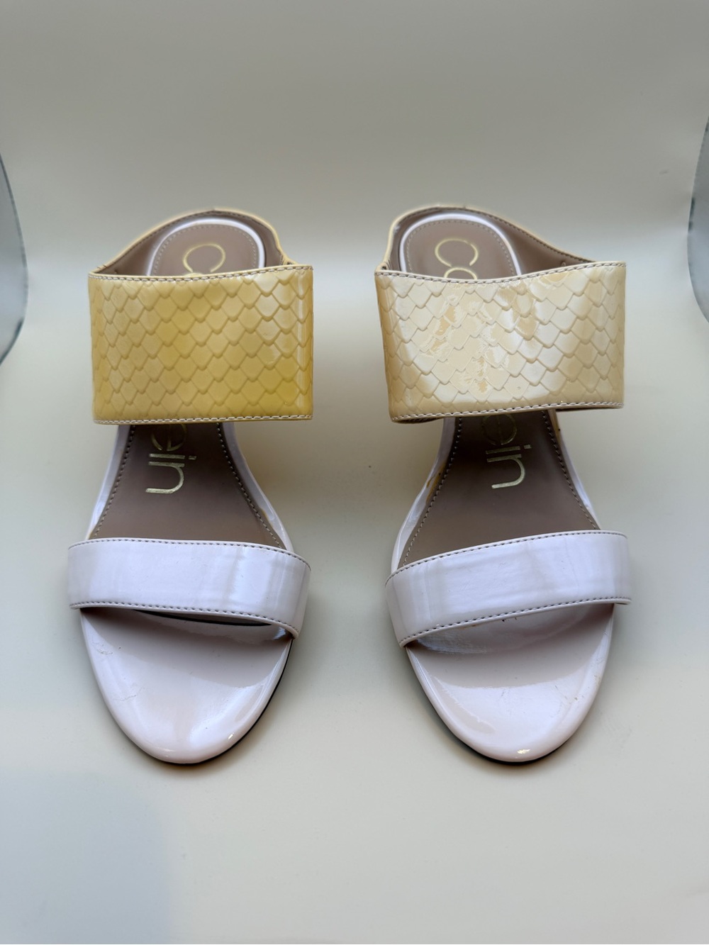 Calvin Klein Women’s Two-Band Slide Sandals in Cream and Pale Yellow